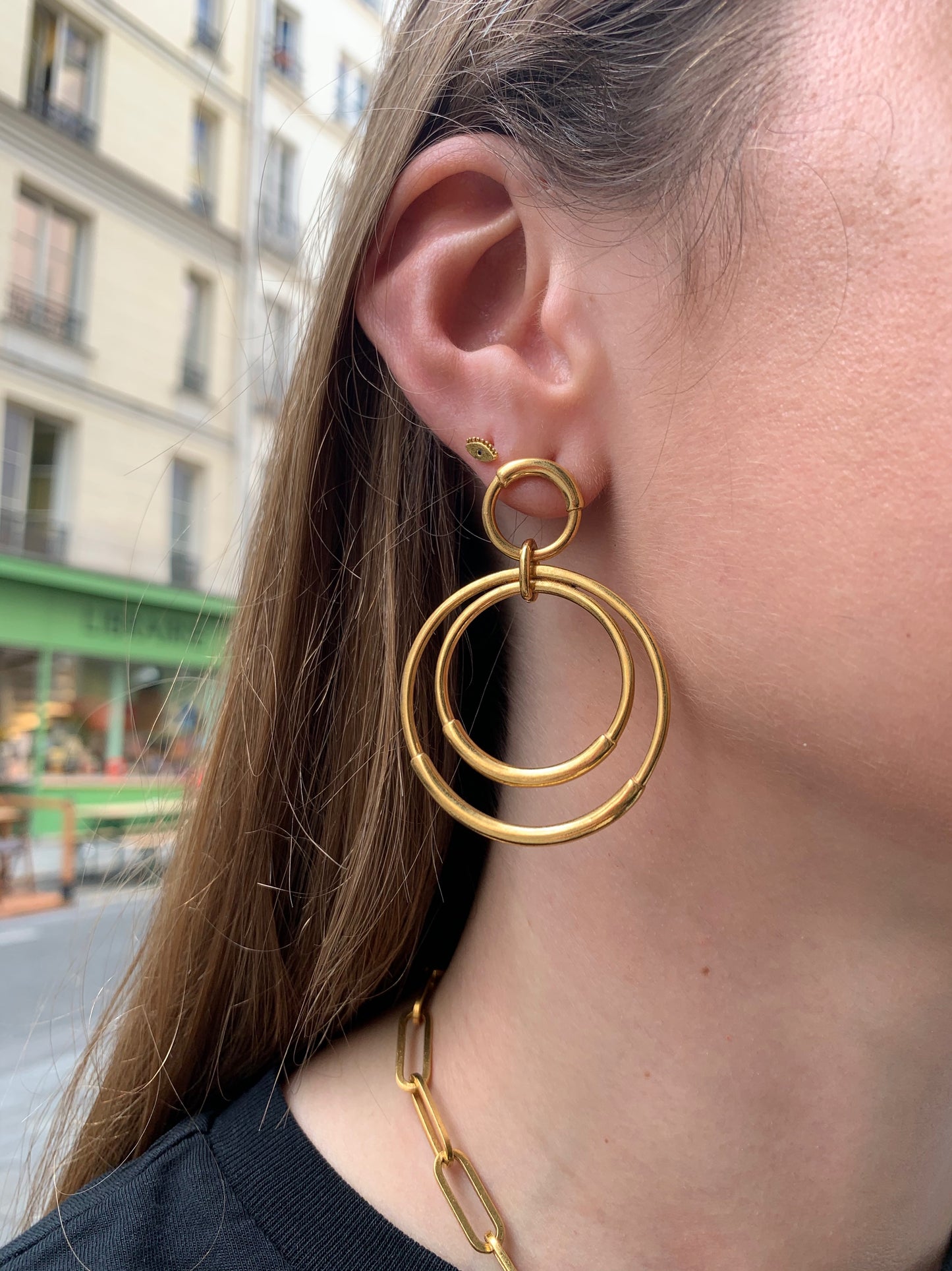 Boucle d'oreille à l'unité Oeil doré