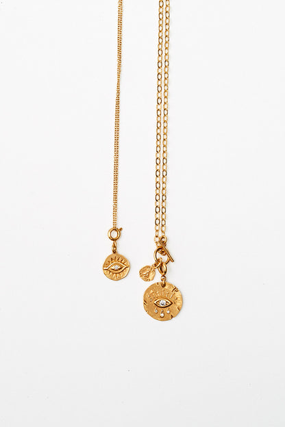 Médailles yeux dorées