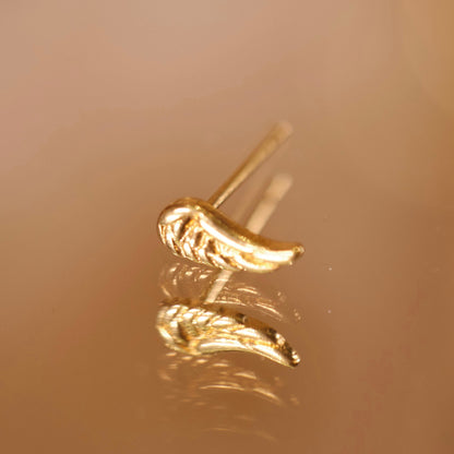 Boucle d’oreille à l’unité Wing dorée