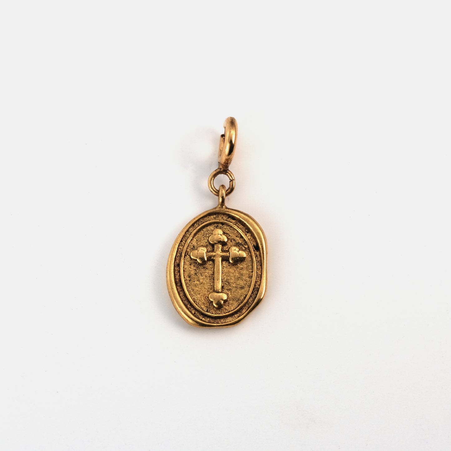 medallion cross pendant